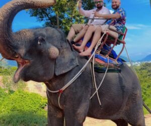 enjoying elephant ride at Phuket Elephant Sanctuary, thailand